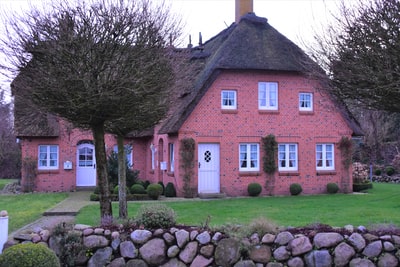 White cement in brown house
